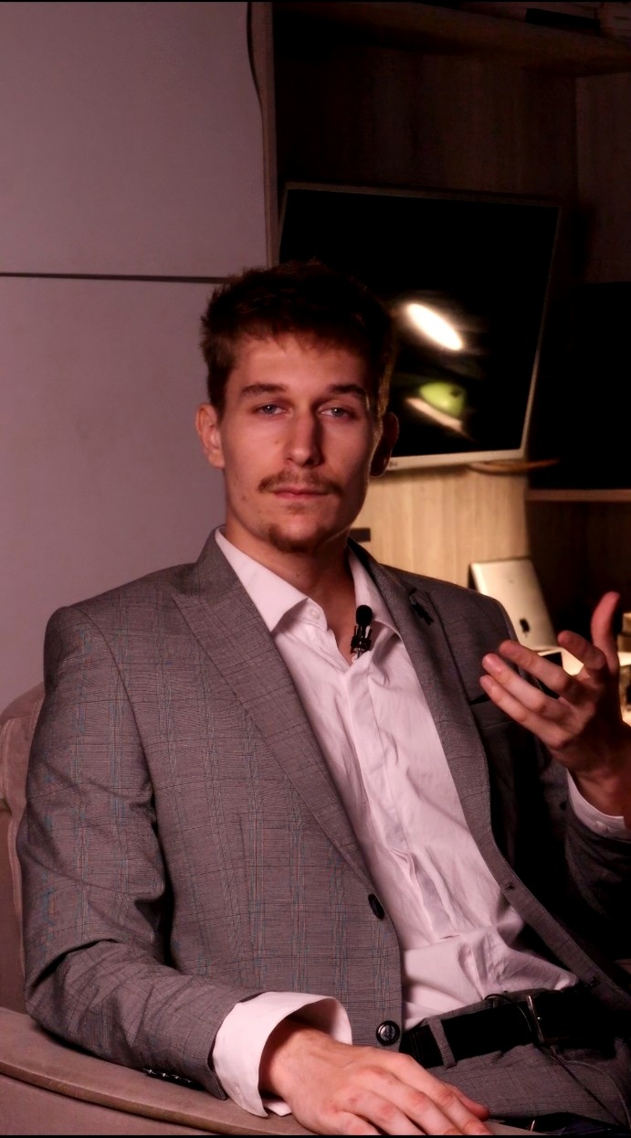 Aleksa Skendzic in a gray suit